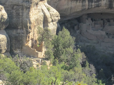 Cliffhouse behind houses